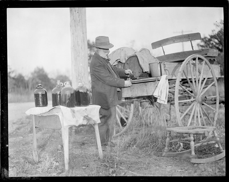 Man operates still of liquor out of the back of a carriage