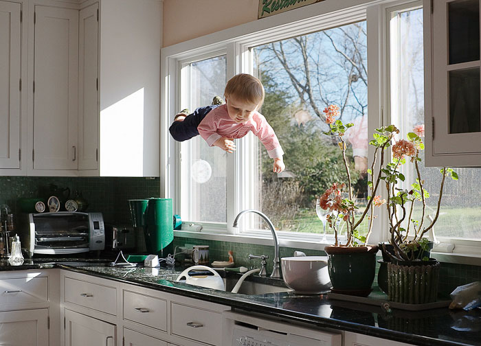 flying baby henry by rachel hulin 2 Creative Dad Photoshops Daughter Into Funny Situations