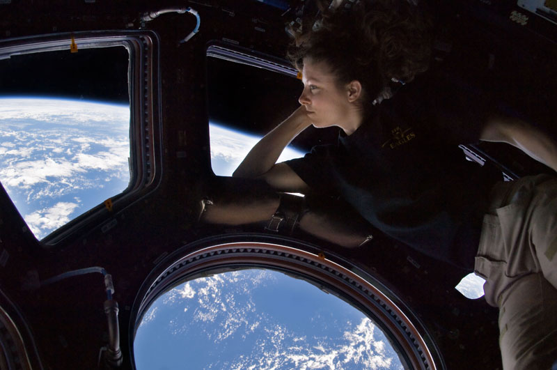 tracy caldwell dyson on board iss looking at earth The 2011 Wikimedia Commons Pictures of the Year