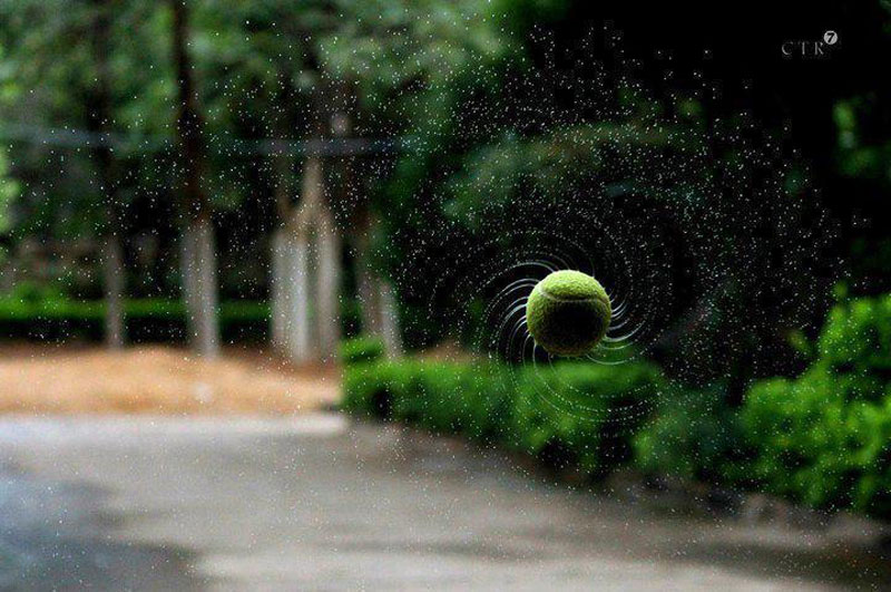 tennis ball spiral spinning water droplets Picture of the Day: Top Spin