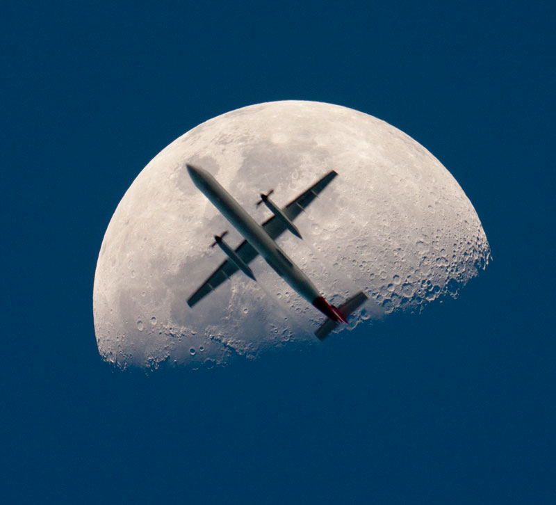 airplane passing the mooon perfect timing Picture of the Day: An Airplane Crosses the Moon