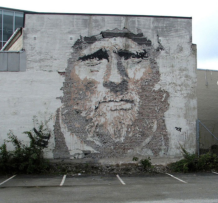 portraits chiseled into walls street art vhils alexandre farto 8 Colossal Street Art by Sainer and Bezt
