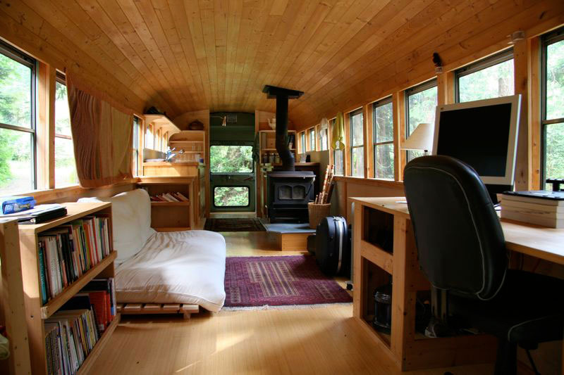 school bus conversion into mobile home 4 This Guy Built a Rustic Cabin Man Cave for $107