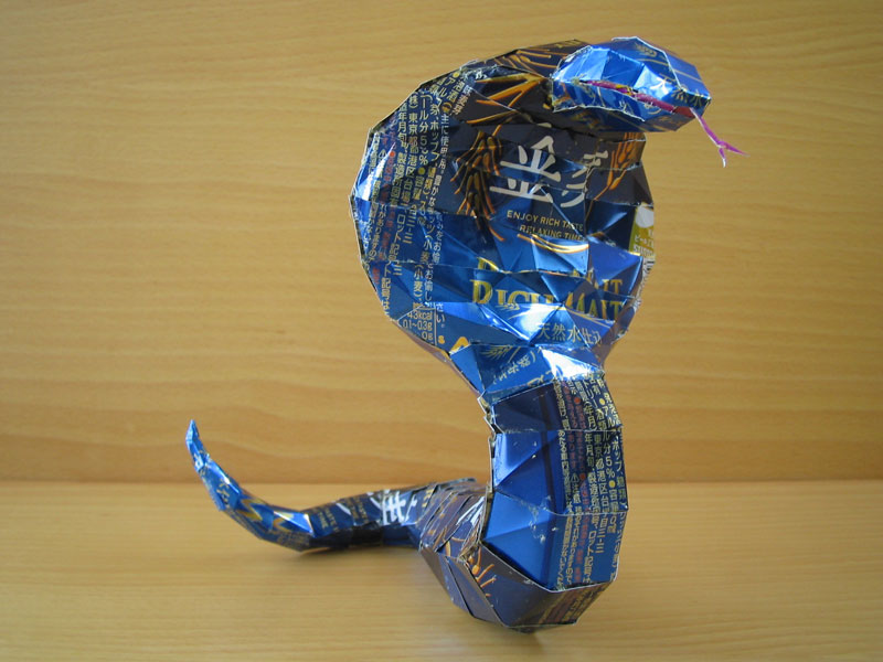 cobra snake made from aluminum cans japanese artist makaon