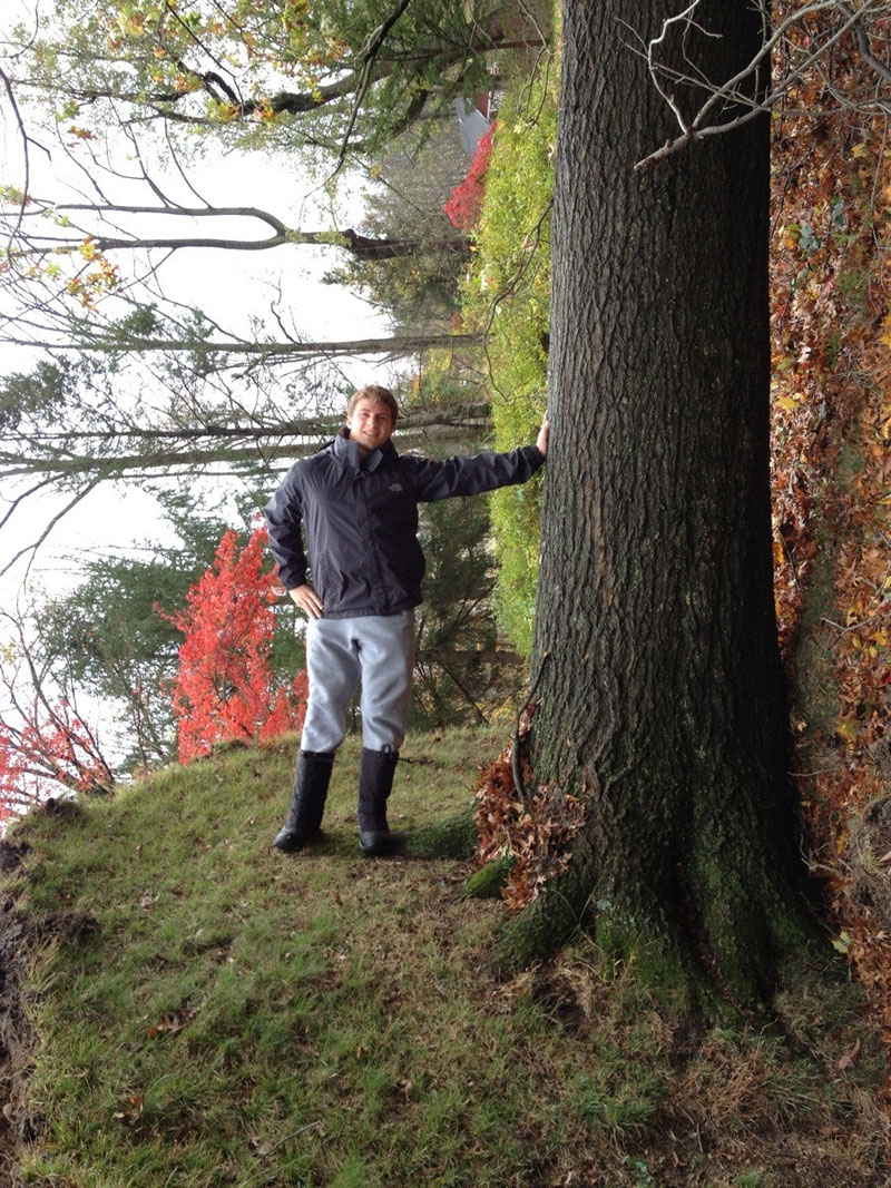 posing with uprooted tree horizontally upright Picture of the Day: Horizontally Upright