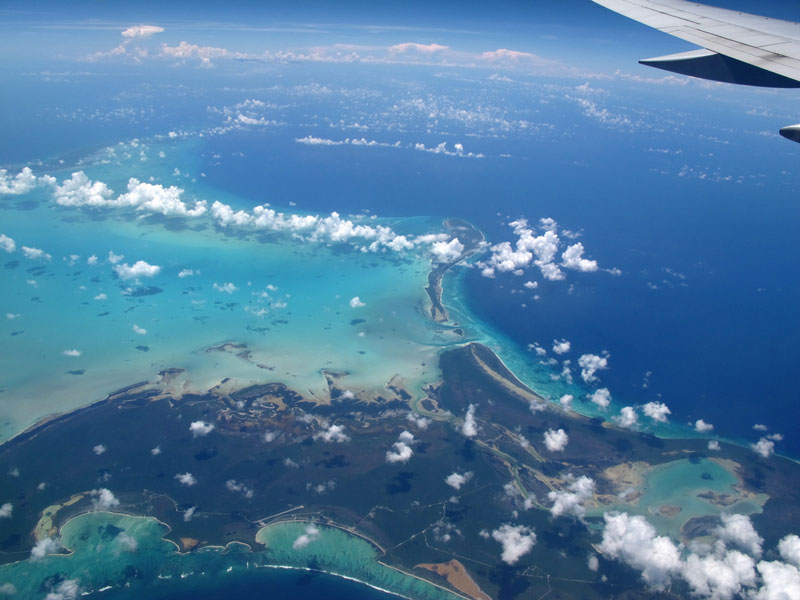 view of caribbean from airplane window aerial barbados Seeing the World Through an Airplane Window