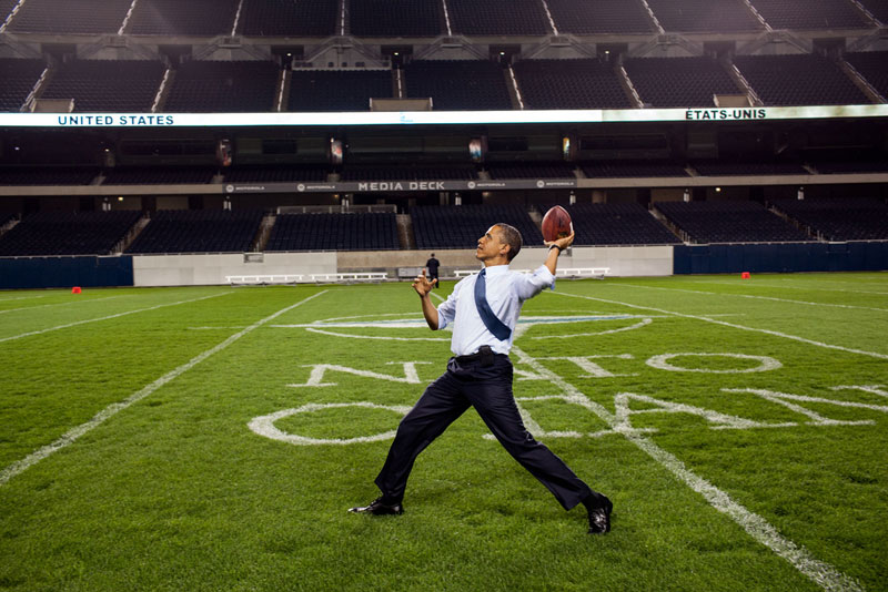 obama throwing football soldier field