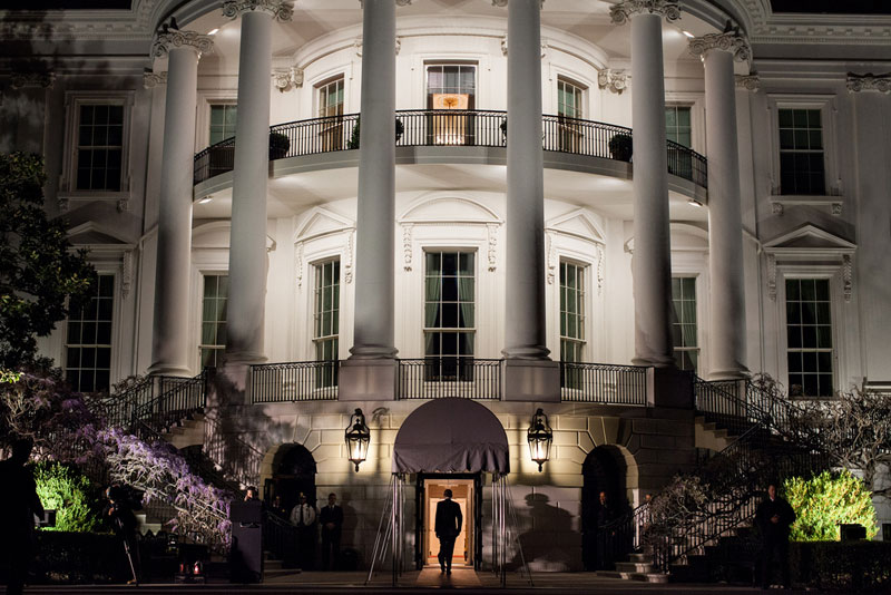 obama walking into white house