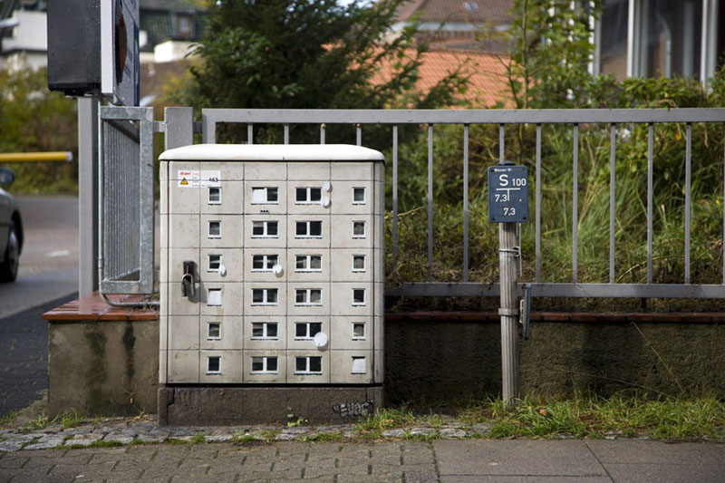 street art apartment building stencils by evol 25 Artist Turns Utility Box Into Ceramic Tile Illusion