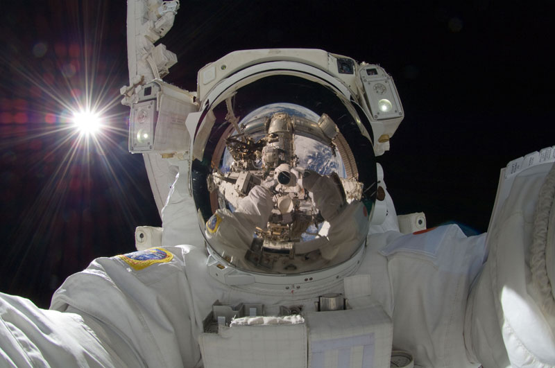 self portrait in space aki hoshide earth reflected in helmet Picture of the Day: The Space Selfie