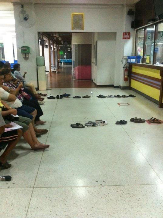 waiting in line in thailand shoes lined up people sitting The Shirk Report   Volume 201