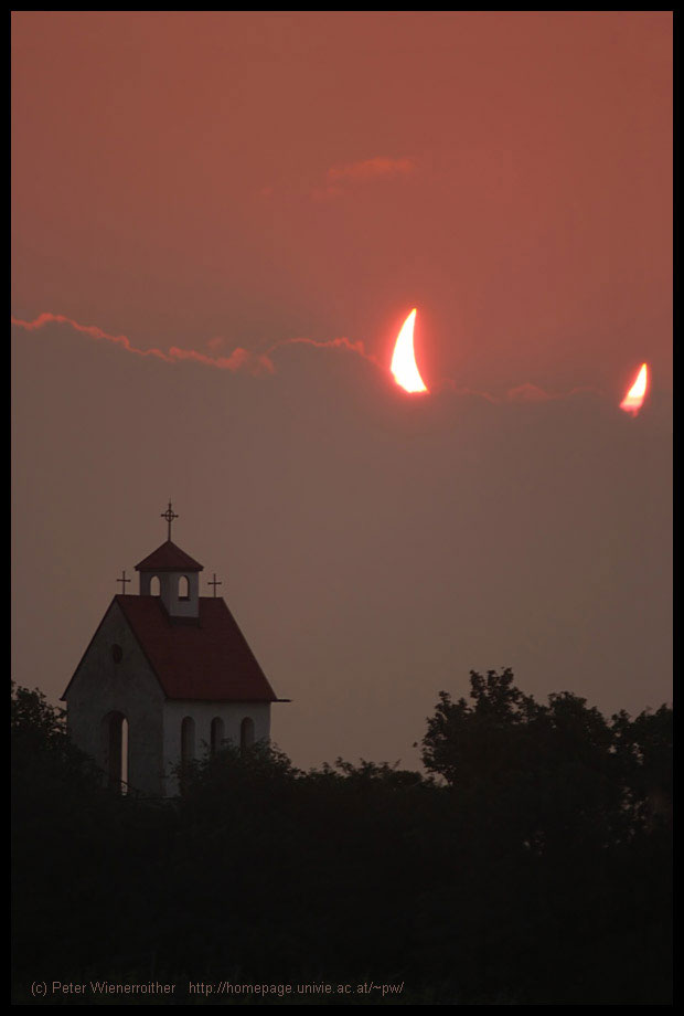 partial solar eclipse devil horns sun The 50 Most Perfectly Timed Photos Ever