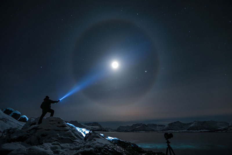 shining flashlight onto moon at night Picture of the Day: Moon Beam