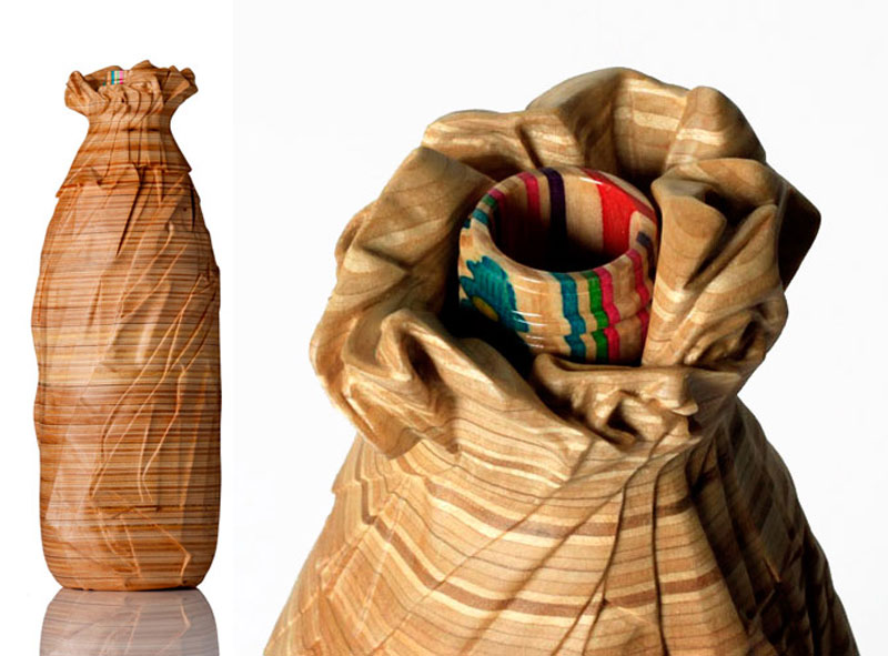 40 oz oe in paper bag made from old skateboard decks haroshi 11 Sculptures Crafted from Old Skateboard Decks