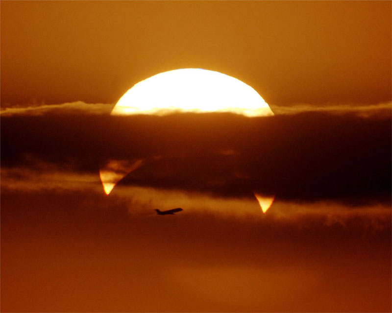 airplaine crosses partial solar eclipse Picture of the Day: Flyby Eclipse