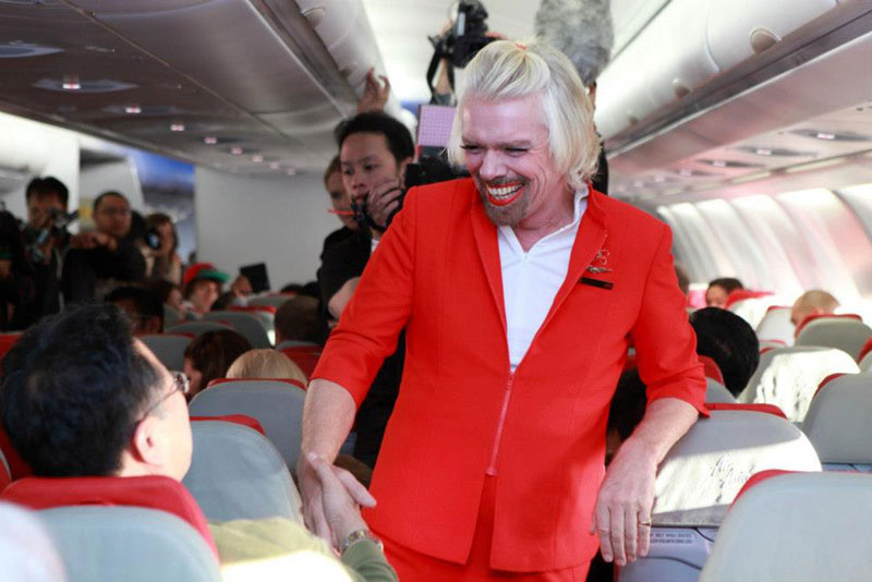 richard branson loses bet dresses as a female stewardess (1)