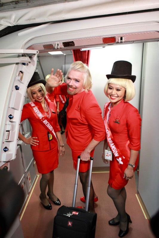 richard branson loses bet dresses as a female stewardess (10)