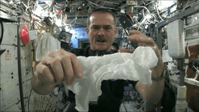 chris hadfield wringing out wet cloth