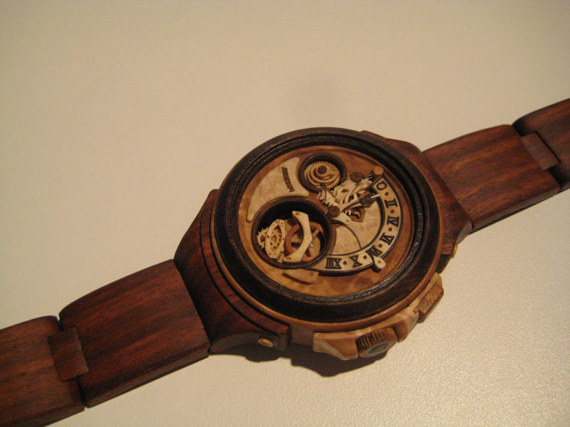 functional watches made out of wood by valerii danevych 2 This Astronomical Watch Shows Our Solar System Orbiting the Sun