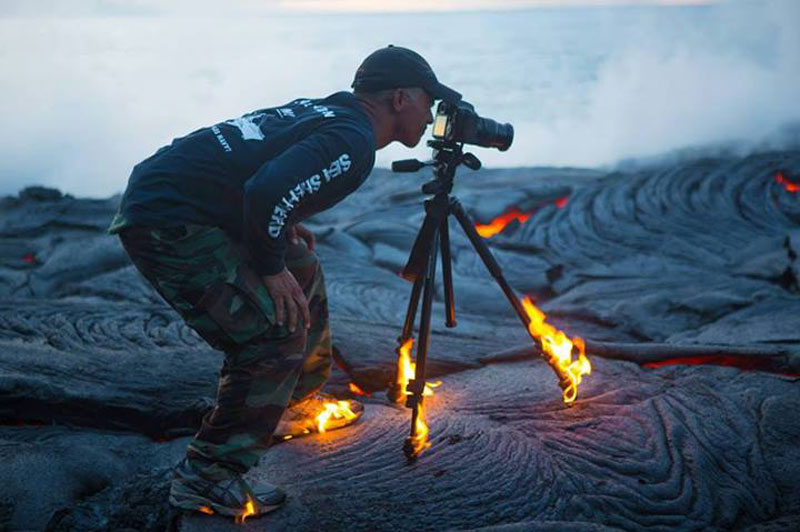 kawika singson standing on lava shoes tripod on fire Picture of the Day: In the Heat of the Moment