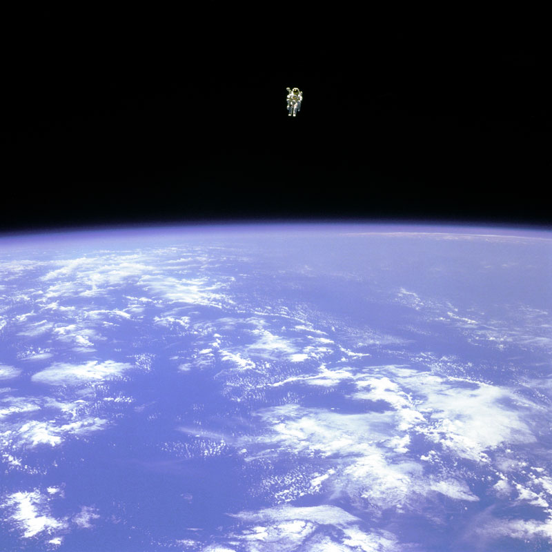 Bruce McCandless II free flying in space floating untethered