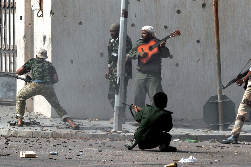 libyan civil war revolution guitar player 2011 bard qatar hero 6 Powerful Images of Music in Unexpected Places