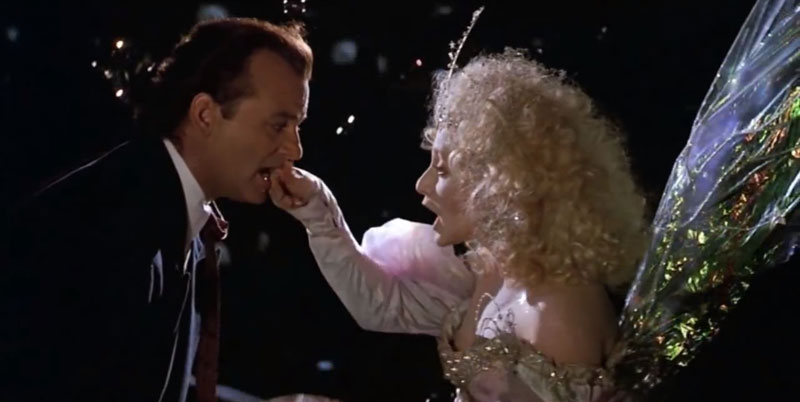 scrooged-ghost-of-christmas-present-grabbing-bill-murray's-lip