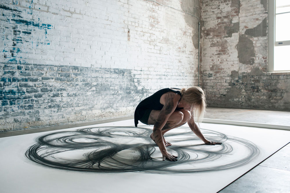 heather hansen uses entire body to create larger than life charcoal drawings 8 Light Bending Dance Performance Will Touch Your Soul