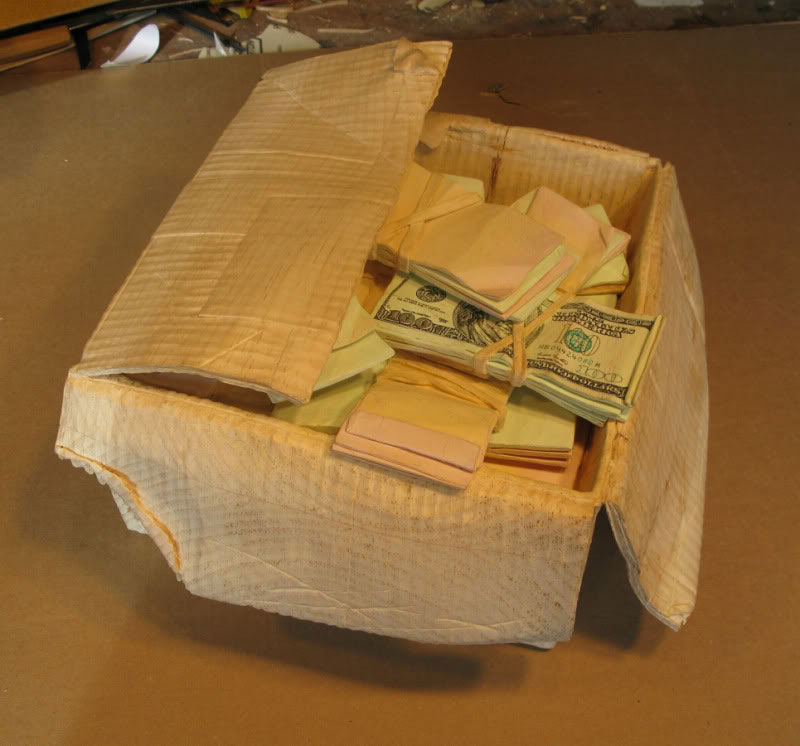 randall rosenthal carves a block of wood into a box of money (12)