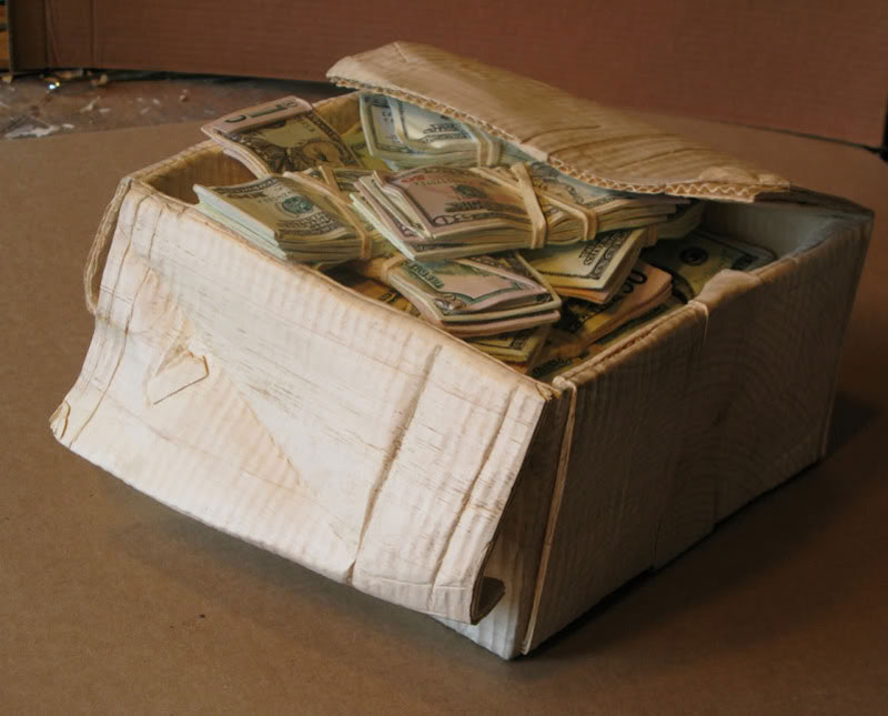 randall rosenthal carves a block of wood into a box of money (15)