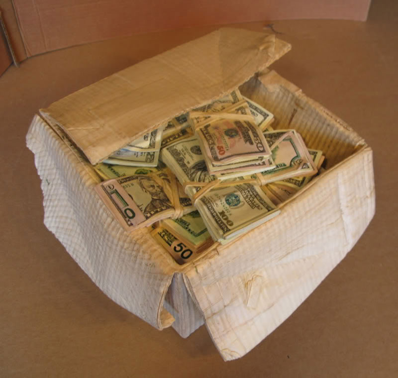 randall rosenthal carves a block of wood into a box of money (17)
