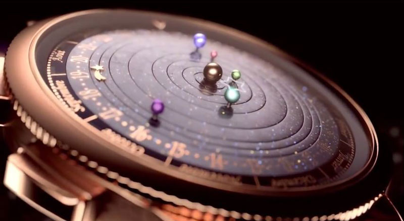 wristwatch shows solar system planets orbiting around the sun 10 This 3D Printed Clock Writes the Time with a Marker