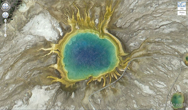 grand prismatic spring yellowstone natonal park on google earth This Million Square Foot Artwork in the Sahara is Still Visible After 17 Years