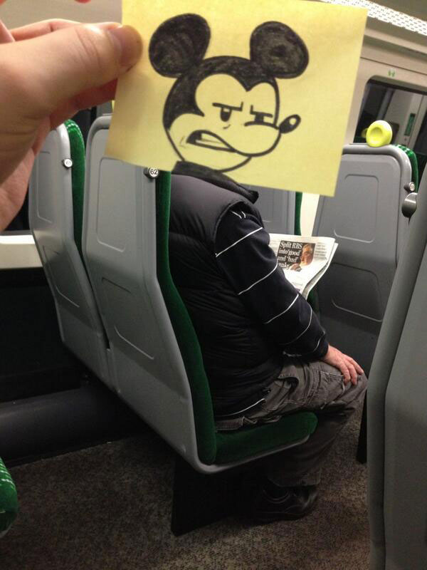 october jones gives people cartoon faces on train ride to work (1)
