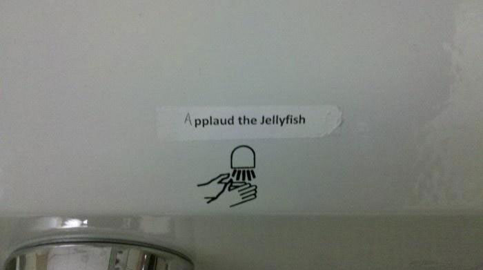 applaud the jellyfish sign