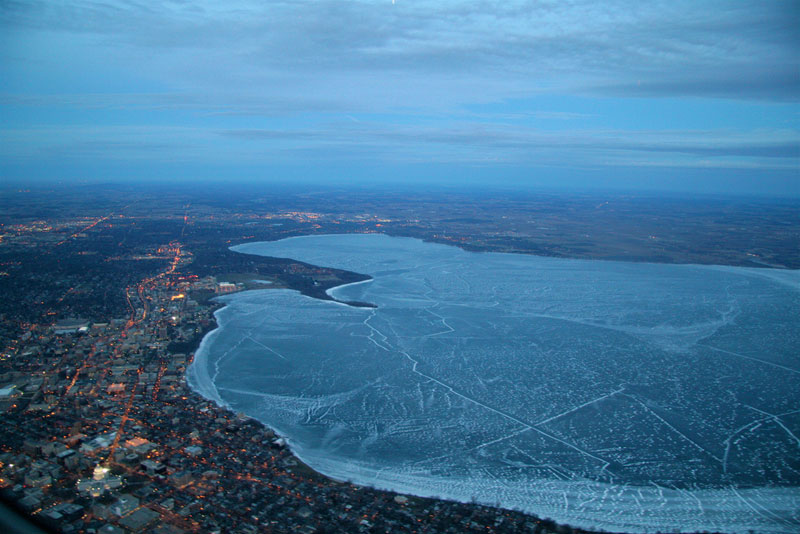 lake mendota frozen from an airplane aerial view from above