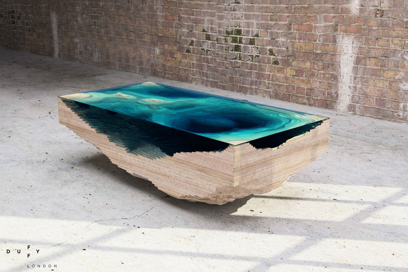 layered glass coffee table shows depths of the oceans by duffy london 2 Molten Metal Meets Wood to Create One of a Kind Furniture