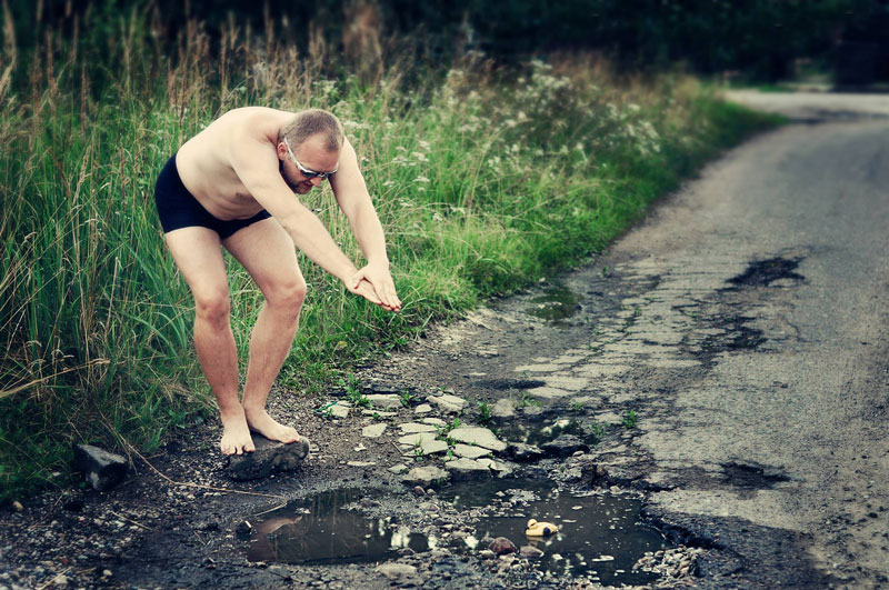 lithuanian artists create funny photos to highlight their citys pothole problem (5)