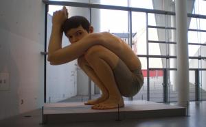 giant boy crouching sculpture hyper realistic art ron mueck giant boy crouching sculpture hyper realistic art ron mueck