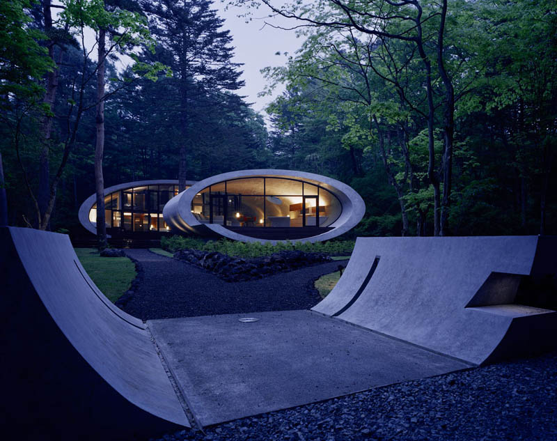 An Oval-Shaped Villa in the Forests of Japan