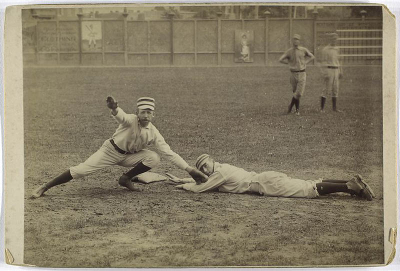 strangely awesome vintage baseball photo sliding into second
