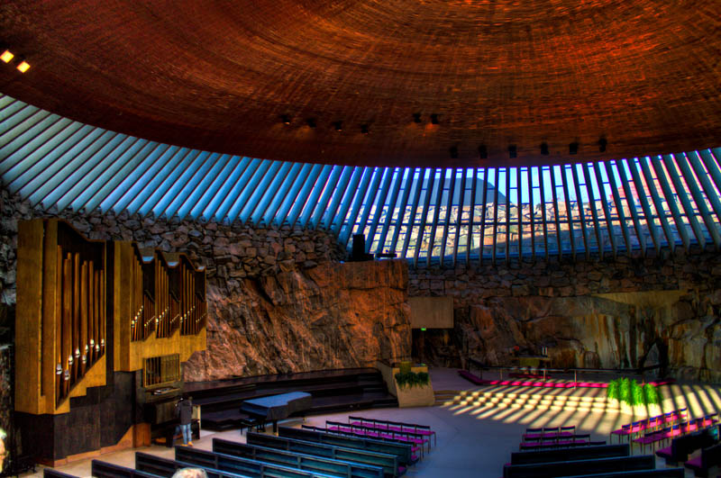 interior shot of the Temppeliaukio Rock Church in helsinki finland from the balcony during the day