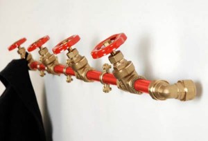 pipe with valves as coat rack