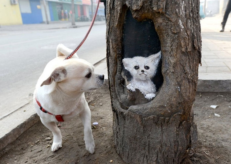 Painter Turns Tree Holes into Works of Art