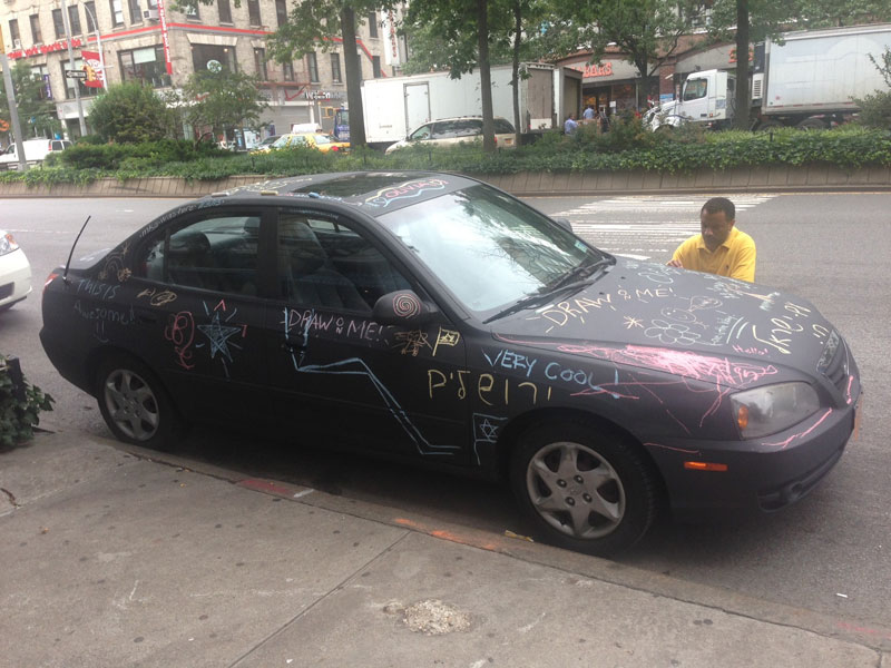 Artist Covers Car in Chalkboard Paint, Lets People Draw On It