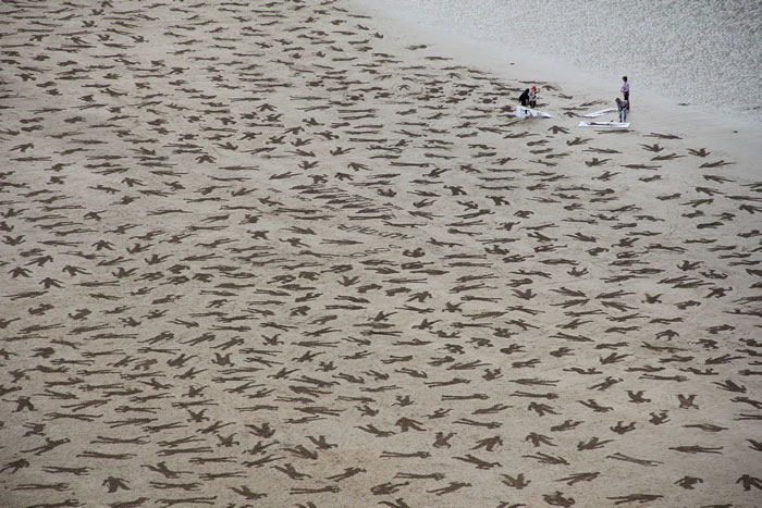 Volunteers Etch 9000 Figures onto Normandy Beach in D-Day Memorial ...