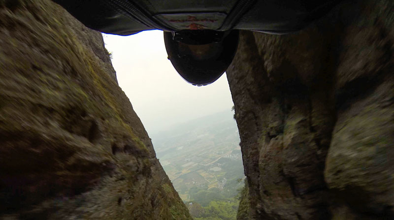 Here's What Wingsuit Flying Through a 20 ft Gap at 100 mph Looks Like