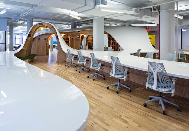 This 1,100 ft long Office Desk Seats All 125 Employees