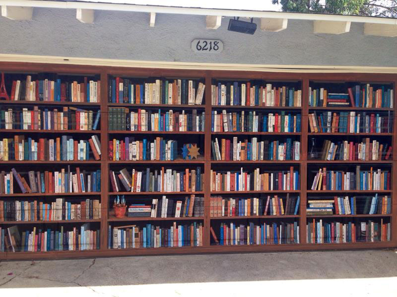 Picture of the Day: Giant Bookcase Painted on Garage Door