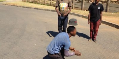 Street Performers in South Africa Do Amazing Floating Hat Trick